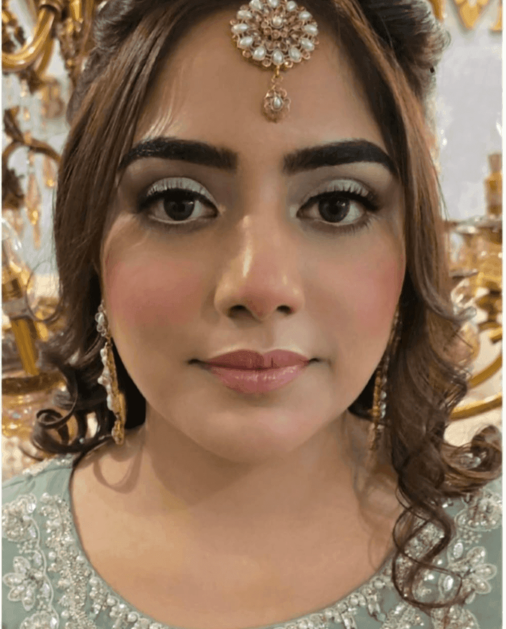 Bridal close-up with maang tikka — Rabbiz Salon